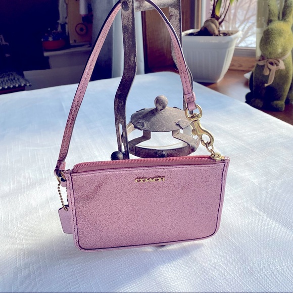 Coach Handbags - Rose and glitter coach wristlet with handle